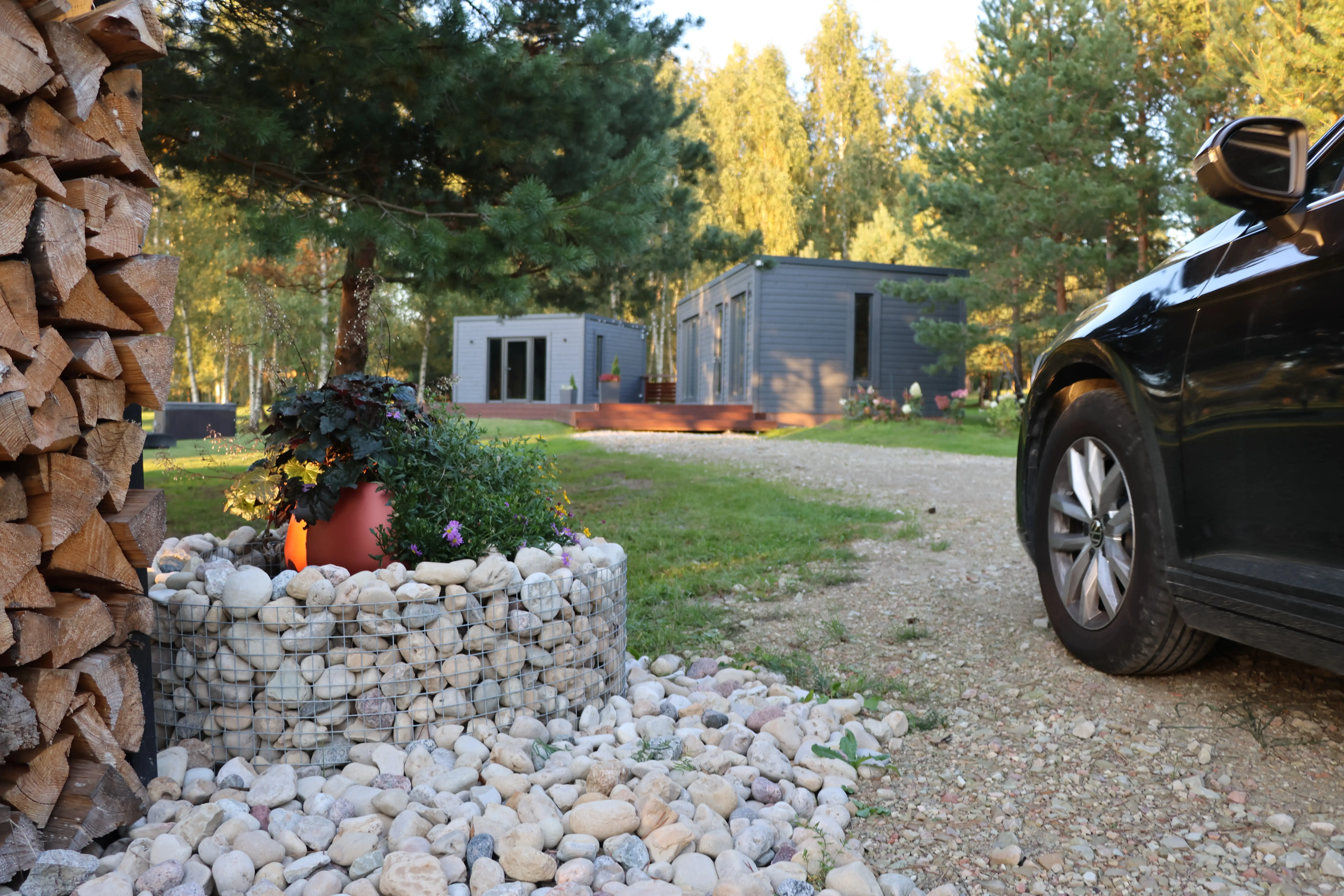 Image with house, terrace, forest and car